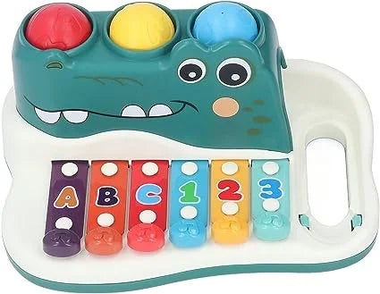 xylophone pounding balls with hammer crocodile 1